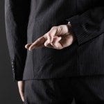 many with fingers behind back